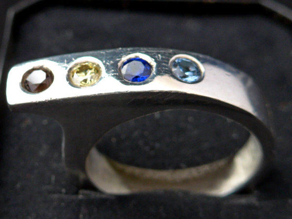Zilveren ring met 4 kleuren Zirconia met bijpassende hanger