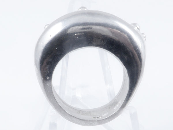 Massieve, gegoten zilveren ring met twee gezichten