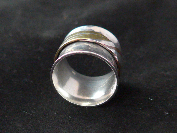 Zilveren ring met losdraaiende buitenring
