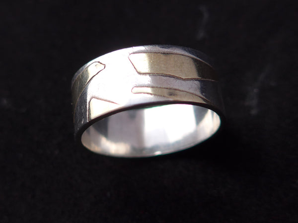 Zilveren ring met geelgouden vlakken