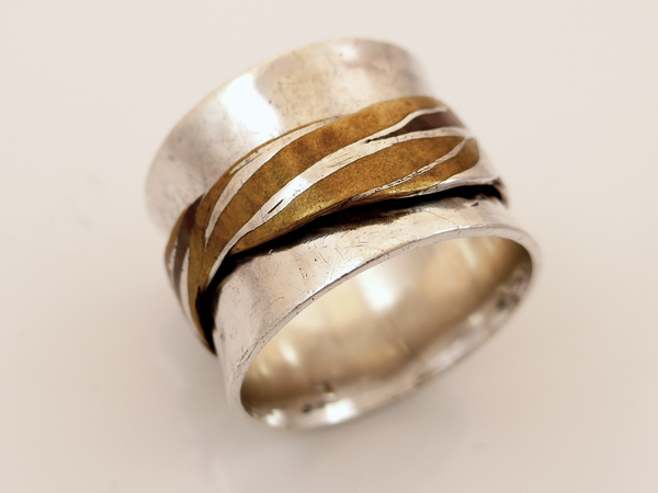 Zilveren ring met losdraaiende buitenring