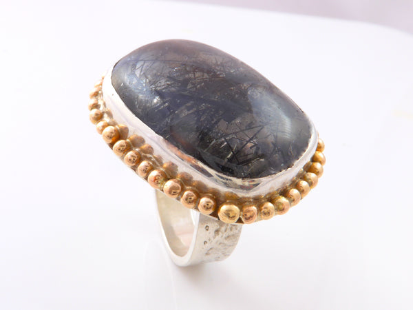 Zilveren ring met Rutielkwarts met rondom geelgouden granules