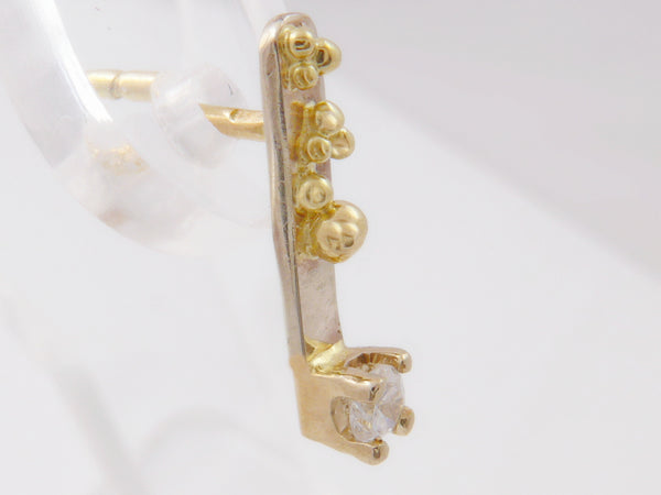 Geelgouden oorstekers met Zirconia en granules