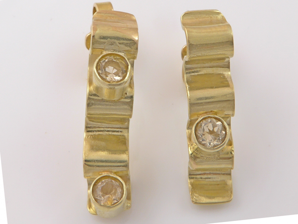 Gouden oorstekers met Citrien