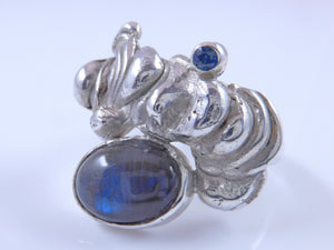 Zilveren ring met blauwe Labradoriet en Saffier